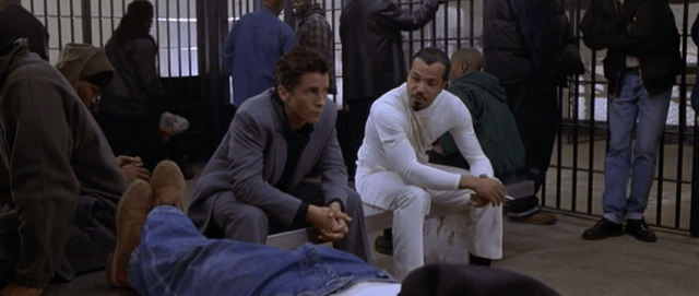 Walter Wade, Jr. (Christian Bale) and "Peoples" Hernandez (Jeffrey Wright)